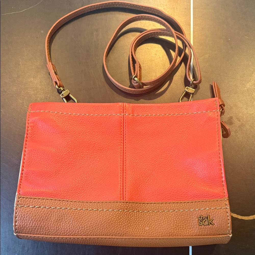 The Sak Coral and Brown Leather Crossbody Bag with removable leather strap